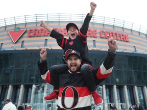 Murray Guthrie and his son Reece were excited to see a Senators game Wednesday night.