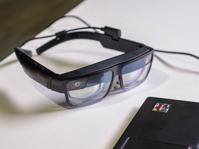 Lenovo's smart glasses let you display up to 5 virtual monitors in front of you.