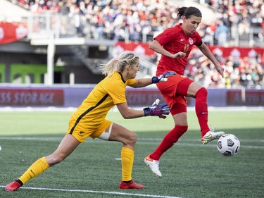 Canada's Christine Sinclair got the ball past New Zealand's goalkeeper, Erin Nayler, for a first-half score.