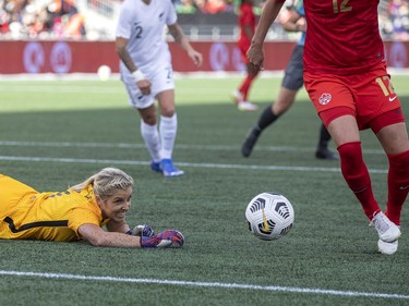 Canada's Christine Sinclair, right, got the ball past New Zealand's goalkeeper, Erin Nayler, for a first-half score.