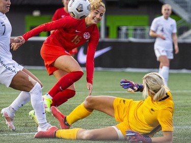 The Canadian national women's soccer team took on New Zealand in a friendly match at TD Place on Sunday at The Women's National Team Celebration Tour. Canada's #16 Janine Beckie tried to get the ball past New Zealand's goalie Erin Nayler.
