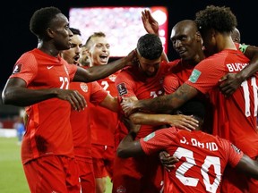 Canada celebrates after scoring a goal during a 2022 World Cup Qualifying match against El Salvador at BMO Field in September. Getty Images