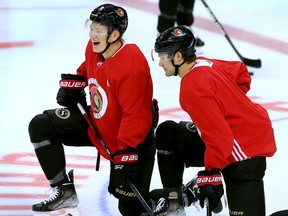 After finally being signed for a $57.5 million, seven-year contract, Brady Tkachuk (left) was on the ice for practice Friday with his Ottawa Senators teammates at Canadian Tire Centre.