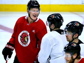 After finally being signed for a $57.5 million, seven-year contract, Brady Tkachuk (red) was on the ice for practice Friday with his Ottawa Senators teammates at Canadian Tire Centre.