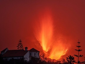 Lava flows from the Cumbre Vieja Volcano in La Palma, Spain, Saturday, Oct. 9, 2021.