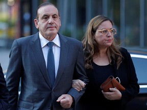 Former Wynn Resorts executive Gamal Abdelaziz (also known as Gamal Aziz), who is charged with participating in a scheme to pay bribes to fraudulently secure the admission of his children to top schools, arrives at federal court as a defendant in the first trial to result from the U.S. college admissions scandal, in Boston, Massachusetts, September 14, 2021.