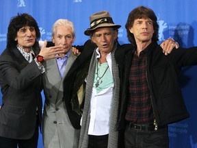 Rolling Stones members (L-R) Ron Wood, Charlie Watts, Keith Richards and Mick Jagger pose during a photocall for their movie Shine a Light at the opening the Berlin Film Festival on Feb. 7, 2008.