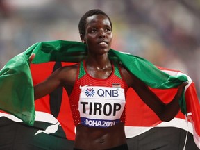 Agnes Jebet Tirop of Kenya celebrates winning bronze in the Women's 10,000 Metres final during day two of 17th IAAF World Athletics Championships Doha 2019 at Khalifa International Stadium on September 28, 2019 in Doha, Qatar.