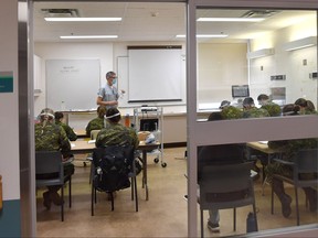 Canadian Armed Forces critical care nurses and a senior nursing officer arrive at the Royal Alexandra Hospital for orientation on Wednesday, Oct. 6, 2021, before beginning work to help alleviate strain on Edmonton's ICUs.