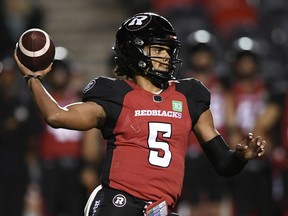 Redblacks quarterback Caleb Evans passed for 191 yards and ran for 59 more in Tuesday's victory against the Elks.