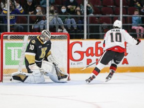 Ottawa's Cameron Tolnai scores his fourth goal of the season on a penalty shot against Kingston netminder Aidan Spooner in the first period of Saturday's game.