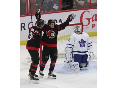 Ottawa Senators taking on the Toronto Maple Leafs during first period action at the Canadian Tire Centre Thursday. Ottawa Senators Drake Batherson helps celebrate Tyler Ennis' first-period goal against Leafs goalie Petr Mrazek.