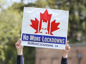 A sign displayed at an anti-lockdown protest.