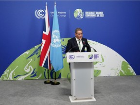 COP26 president Alok Sharma speaks during a news conference outside the Plenary Hall at the close of COP26 on Nov. 13, 2021 in Glasgow, Scotland.