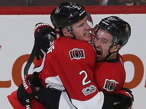 Former Senators defenceman Dion Phaneuf celebrates with Mark Stone after Phaneuf scored in overtime to win Game 2 against the Boston Bruins in the 2017 playoffs. TONY CALDWELL/SUN FILES