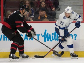 Senators defenceman Nick Holden, left, has tested positive for COVID-19. USA TODAY SPORTS