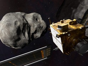 This artist's illustration obtained from NASA on Nov. 4, 2021 shows the DART spacecraft from behind prior to impact at the Didymos binary system.