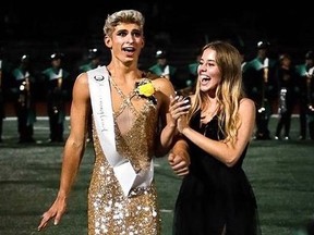 Zachary Willmore, left, and friend, celebrating his win as Missouri's first male homecoming queen.