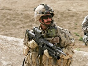 Mark Popov, then a major, is shown in this photo during a patrol in Kandahar province in Afghanistan in 2009.