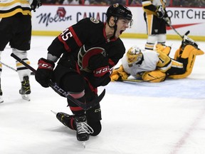 Senators forward Parker Kelly celebrates his second-period goal against the Penguins on Saturday night.
