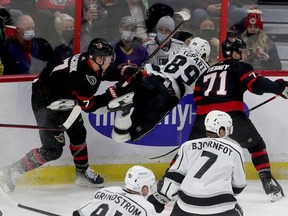 Senators caption Brady Tkachuk hits Kings player Rasmus Kupari during the first period of Thursday's game.