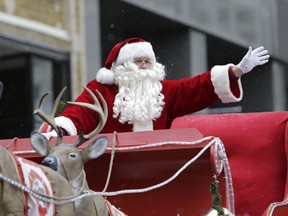 Santa waves to the children during an Ottawa parade in 2017.