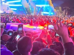 An ambulance is seen in the crowd during the Astroworld music festival in Houston, Texas, U.S., Friday, Nov. 5, 2021 in this still image obtained from a social media video on Saturday..