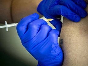 A file photo of a COVID-19 vaccination in Ottawa.