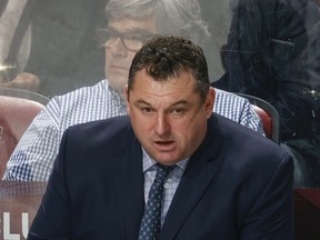 Head coach D. J. Smith of the Ottawa Senators looks on during first period action against the Florida Panthers at the FLA Live Arena on December 14, 2021 in Sunrise, Florida.