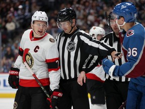 Despite the Sens’ recent struggles, Brady Tkachuk — here getting into it with Avs’ Mikko Rantanen late in their Nov. 22 game at Denver — has tried to set an example of how to play for a full 60 minutes.