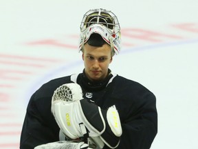 Goalie Leevi Merilainen listens to the coaches at the Canadian Tire Centre in Ottawa, September 13, 2021, during development camp.