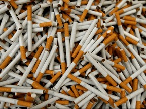 Lucky Strike cigarettes are seen during the manufacturing process in the British American Tobacco Cigarette Factory (BAT) in Bayreuth, Germany, April 30, 2014.