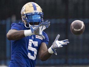 Winnipeg Blue Bombers defensive lineman Willie Jefferson (5) catches a pass during practice in Hamilton, Ont., Friday, Dec. 10, 2021. Winnipeg will meet the Hamilton Tiger-Cats in the 108th CFL Grey Cup game.
