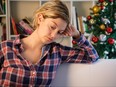 Sad Christmas days for woman at home.