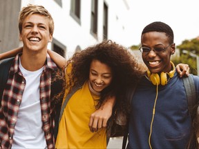 Teenage friends having fun outdoors