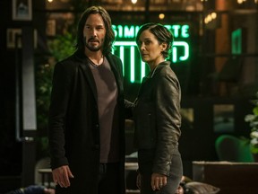 Keanu Reeves and Carrie-Anne Moss star in "The Matrix Resurrections.