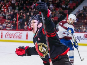 Brady Tkachuk celebrates the overtime winner for the Sens against Colorado Saturday night.