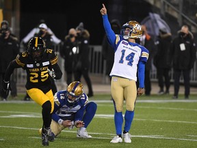 Winnipeg Blue Bombers kicker Sergio Castillo (14) reacts after kicking a field goal against the Hamilton Tiger-Cats during the 108th Grey Cup football game at Tim Hortons Field in Hamilton on Dec. 12, 2021.