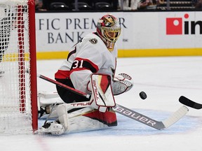 Ottawa Senators goaltender Anton Forsberg (31) blocks a shot against the Anaheim Ducks during the first period at Honda Center.