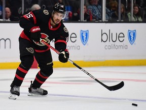 Ottawa Senators defenceman Michael Del Zotto (15) passes the puck against the Los Angeles Kings during the third period at Staples Center, Nov. 27, 2021.