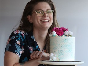 OTTAWA - Dec 7 2021 -   Julia Gindra with one of her cakes she made in Ottawa Tuesday. Julia will be opening her own pastry shop in early 2022, but for now is cooking in the Le Poisson Bleu kitchen. TONY CALDWELL, Postmedia.