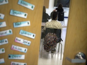 In this file photo taken on Aug. 19, 2020, students are pictured at school in Ottawa.