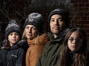 Fredrique Chabot and Mike Godbout with their children Simone, 6, and Léo, 9, who both attend the French public board school named for lawyer and former Supreme Court justice Louise Arbour.