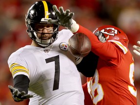 Tershawn Wharton #98 of the Kansas City Chiefs forces a fumble from Ben Roethlisberger #7 of the Pittsburgh Steelers during the fourth quarter at Arrowhead Stadium on December 26, 2021 in Kansas City, Missouri.