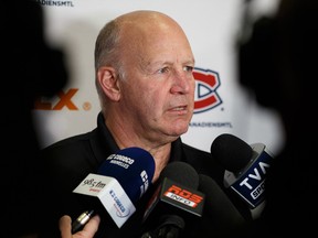 Montreal Canadiens' head coach Claude Julien answers questions from the media after a team practice at Rogers Place in Edmonton, on Friday, Dec. 20, 2019.