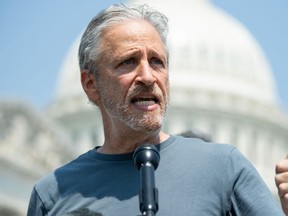 Actor and comedian Jon Stewart speaks during a press conference by members of the US House unveiling the "Honoring our Promise to Address Comprehensive Toxics Act of 2021's legislation, dealing with the effects caused by exposure to toxic substances during military service by veterans, outside the US Capitol in Washington, DC, May 26, 2021.