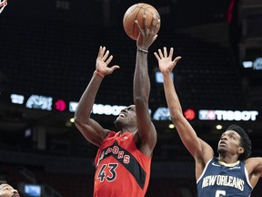 Raptors' Pascal Siakam drives to the basket as New Orleans Pelicans' Herbert Jones tries to defend during the first quarter at Scotiabank Arena on Sunday, Jan. 9, 2022.