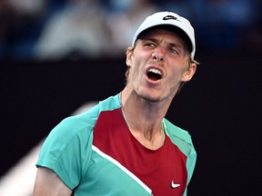 Canada's Denis Shapovalov reacts during his quarter final match against Spain's Rafael Nadal on January 25, 2022 in Melbourne.