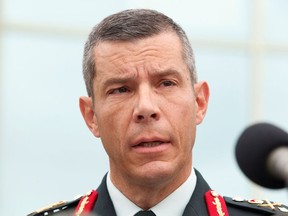 Major General Dany Fortin, formerly in charge of the logistics of Canada's COVID vaccine response, gives a statement outside the Gatineau police station, after being charged with one count of sexual assault in Gatineau, Que., Aug. 18, 2021.