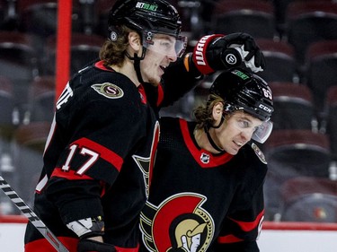 Ottawa Senators centre Adam Gaudette (17) congratulates Ottawa Senators right wing Tyler Ennis (63) after a goal during the first period.